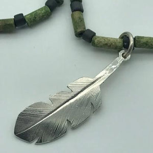 "Spirit Feather" Stg Sil-Pendant, on green stone necklace.